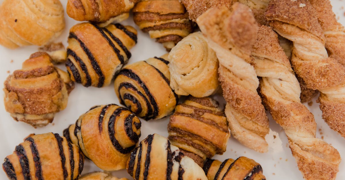 What are these chocolate meringues called? - Brown Bread on White Ceramic Plate