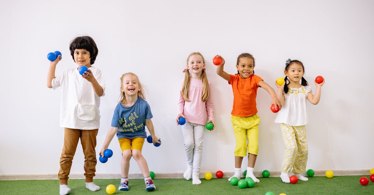 What are these little balls in my sardines? - Little Girls and Boys Having Fun Playing With Colorful Balls