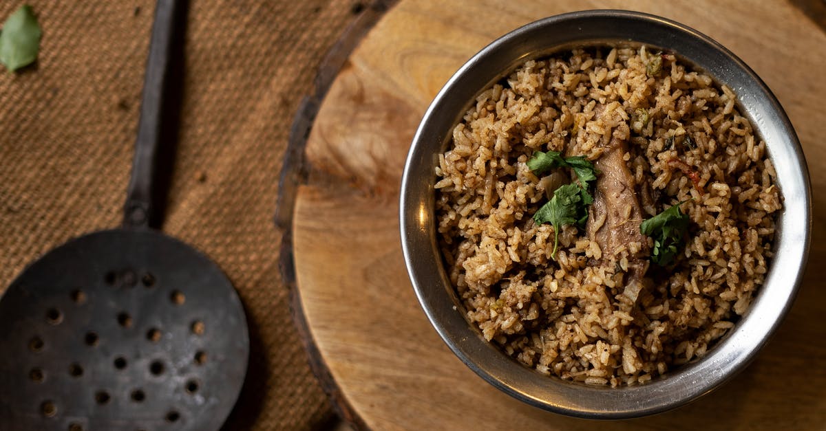 What are these utensils? - A Bowl of Rice and Meat on the Wooden Table