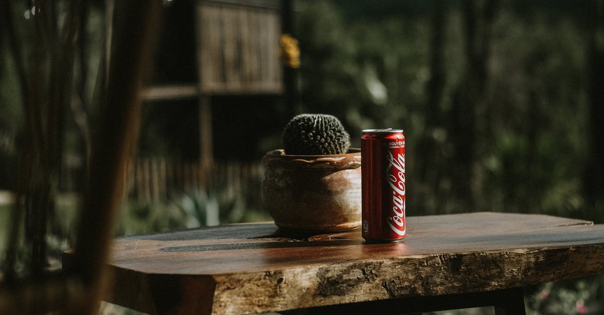 What can I do about scratched pots? - Coca-cola Can on Table