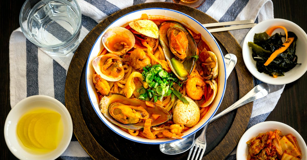 What can I substitute for radish when making kimchi? - Seafood Delicacy on Bowl Near Gray Stainless Steel Fork, Spoon, Chopsticks, Beside Water in Drinking Glass on Table