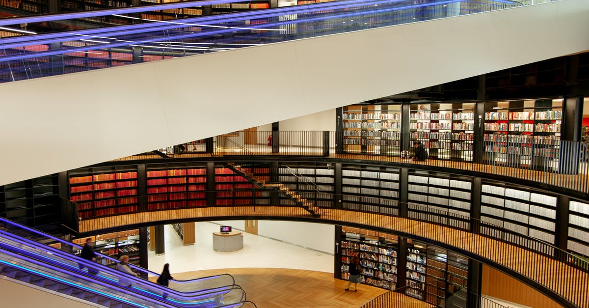 What cheese might compliment New England clam chowder? [closed] - Interior of modern library with escalators