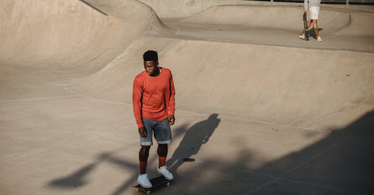 What determines the shape-holding ability of cookies? - Active young male skateboarder riding skateboard on asphalt ramp