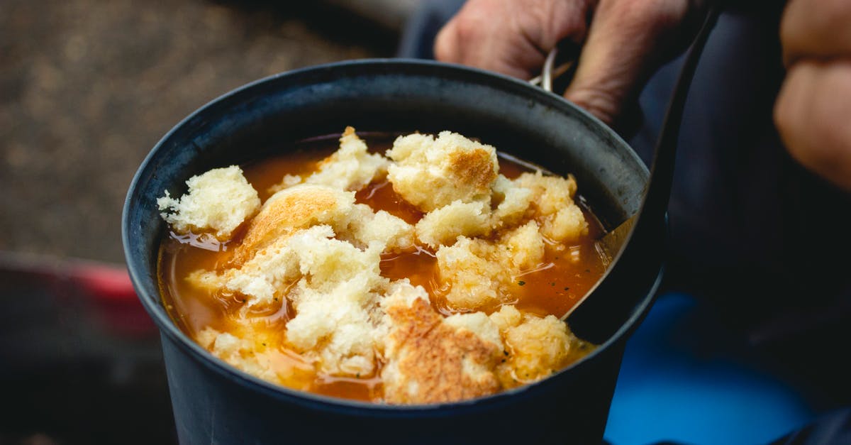 What do you have for breakfast during camping [closed] - Person Cooking Food in Casserole