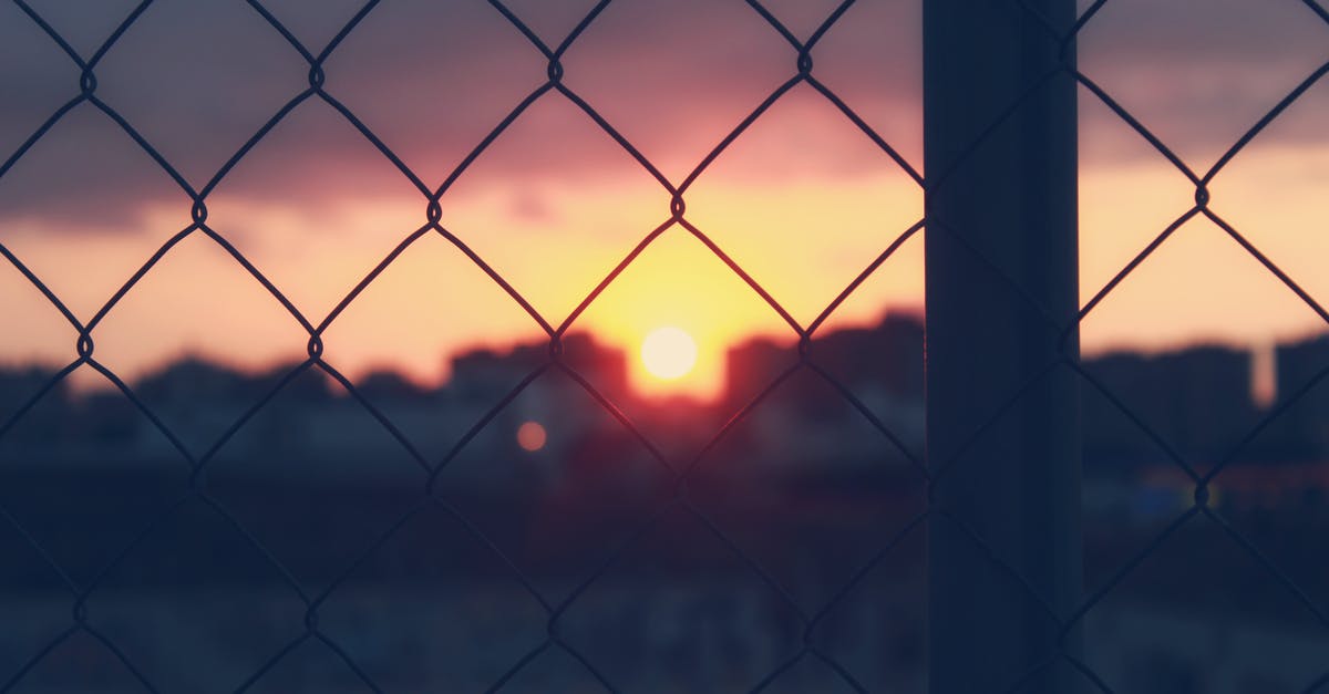 What does al dente really mean? - Close-Up Photo Of Chain Link Fence During Dawn 