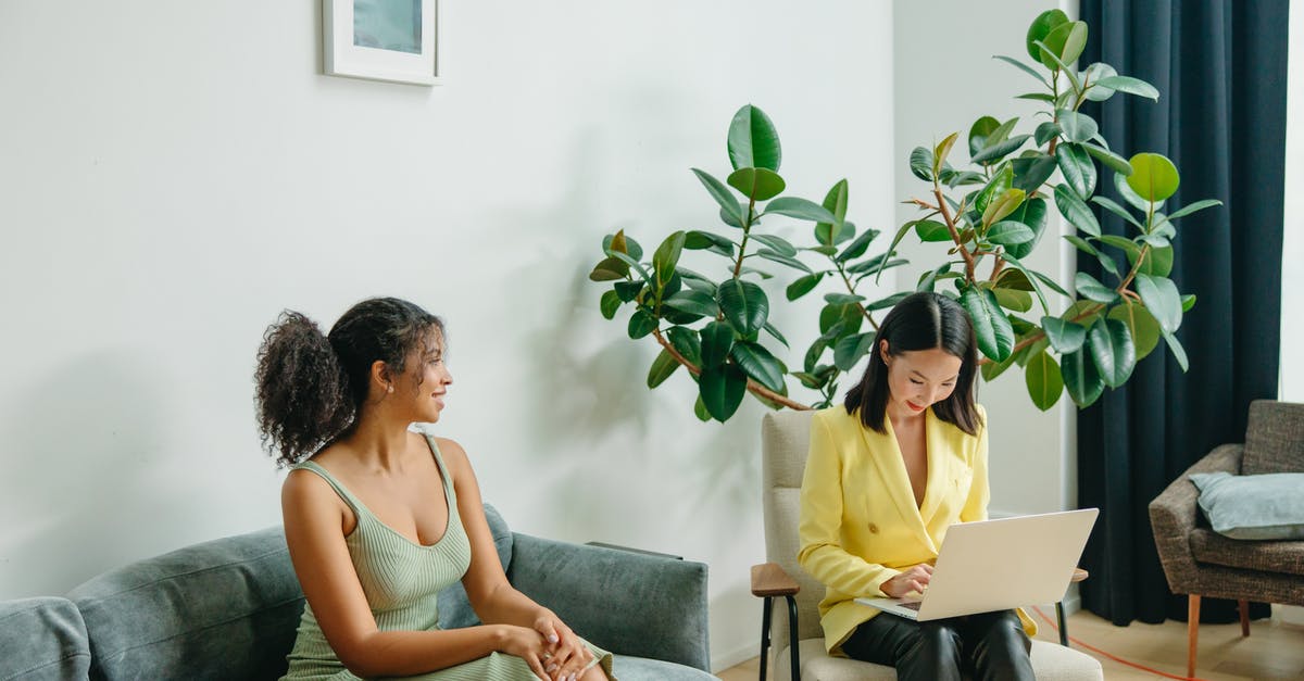 What does it mean to let gluten relax? - Woman in Gray Tank Top Sitting on Gray Couch