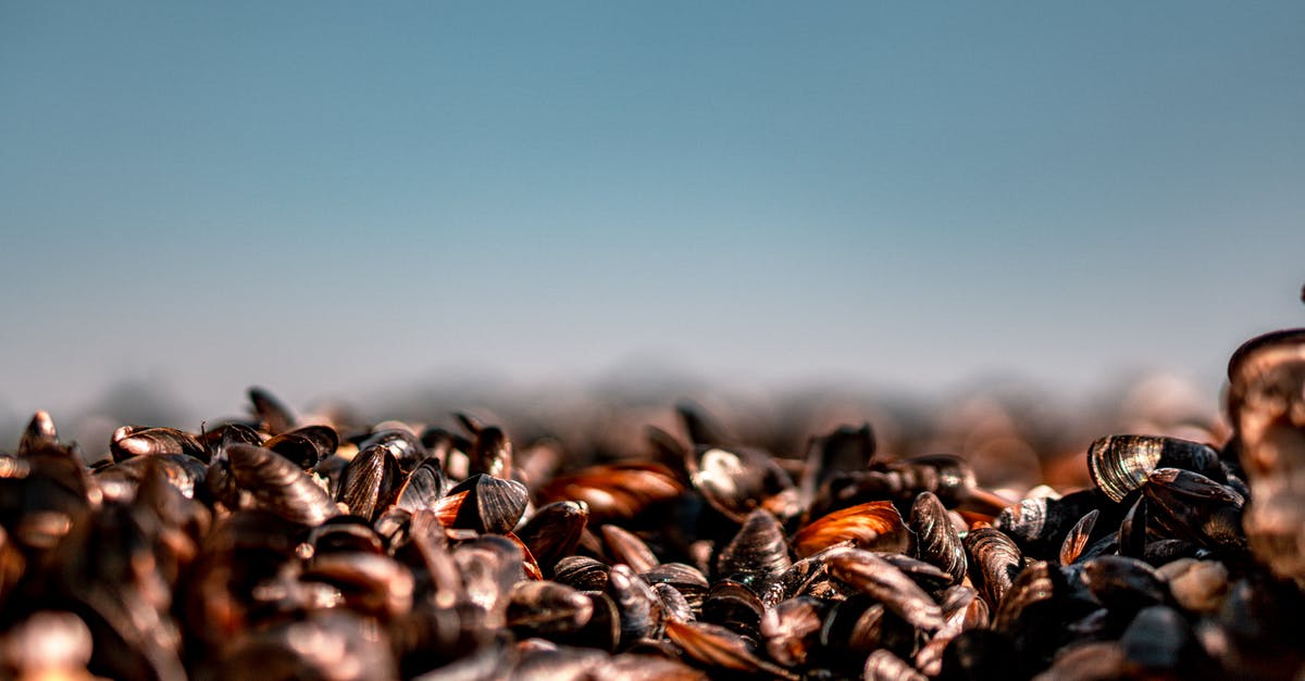 What does "de-bearding" mussels mean? - Brown and Black Coffee Beans