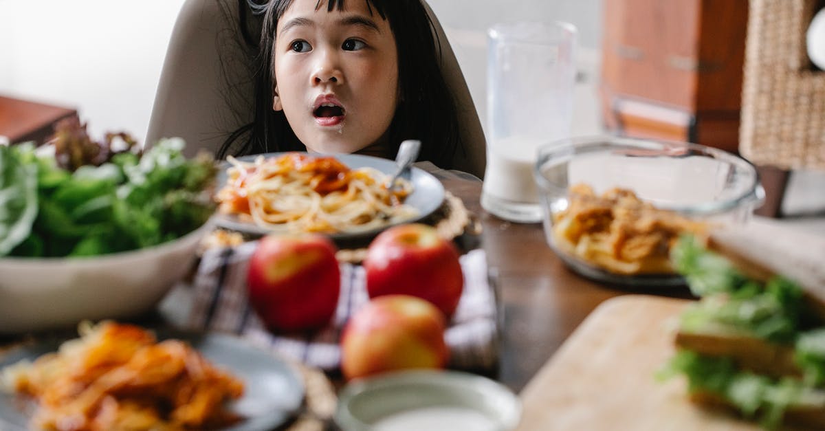 What does "shocking" food do? - Cute little girl having breakfast at home