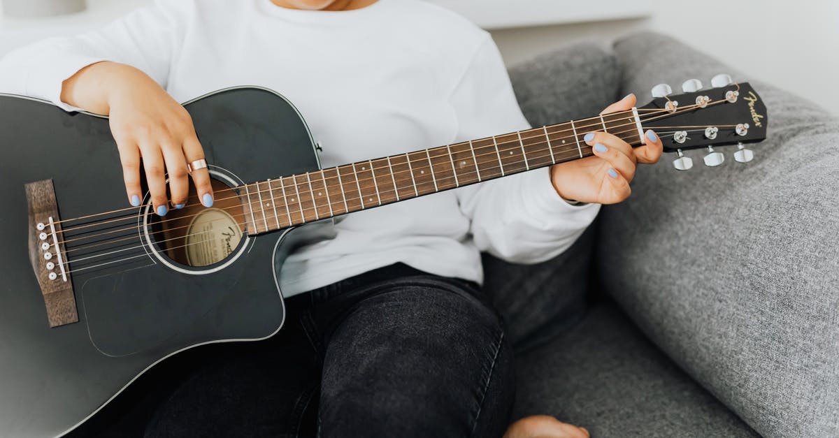 What does resting mean - Boy in White Crew Neck T-shirt Playing Acoustic Guitar