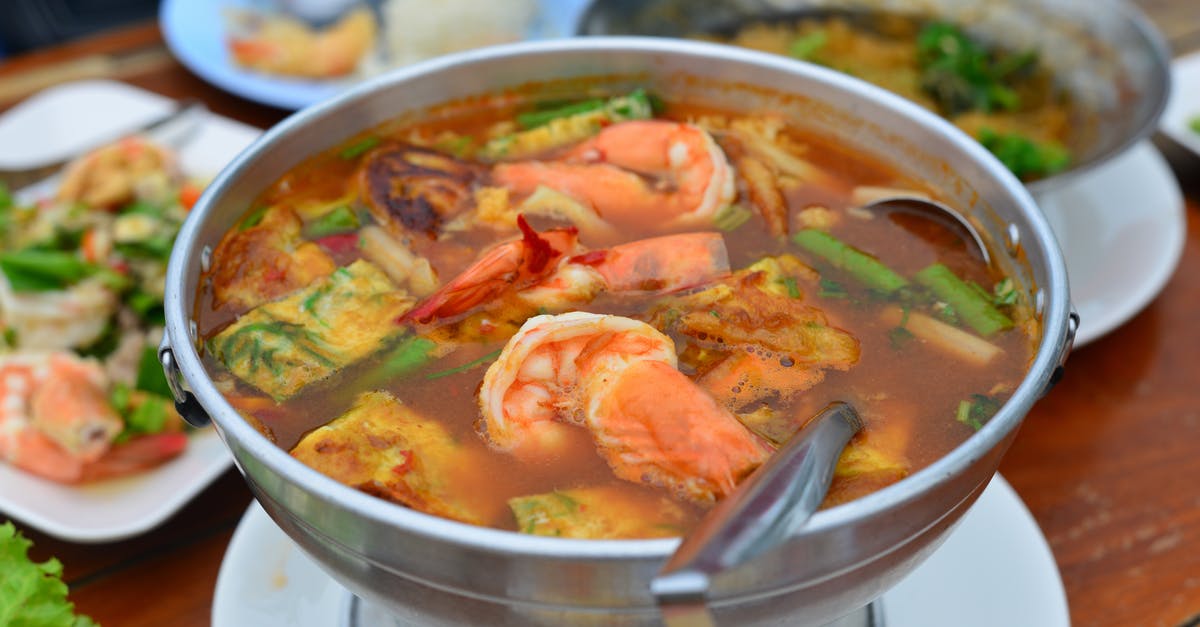 What goes into tom yum soup? [closed] - A Mouthwatering Soup on a Stainless Pot