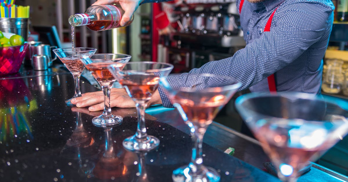 what is a good liquid to replace tequila with? - Photo Of Man Pouring Liqueur On Glass