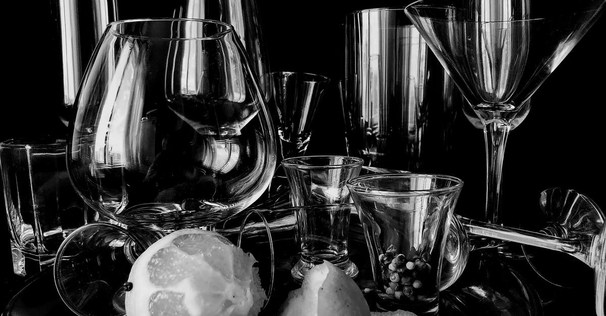 What is Canadian-style sour cream? - Collection of cocktail glassware placed on table with lemon