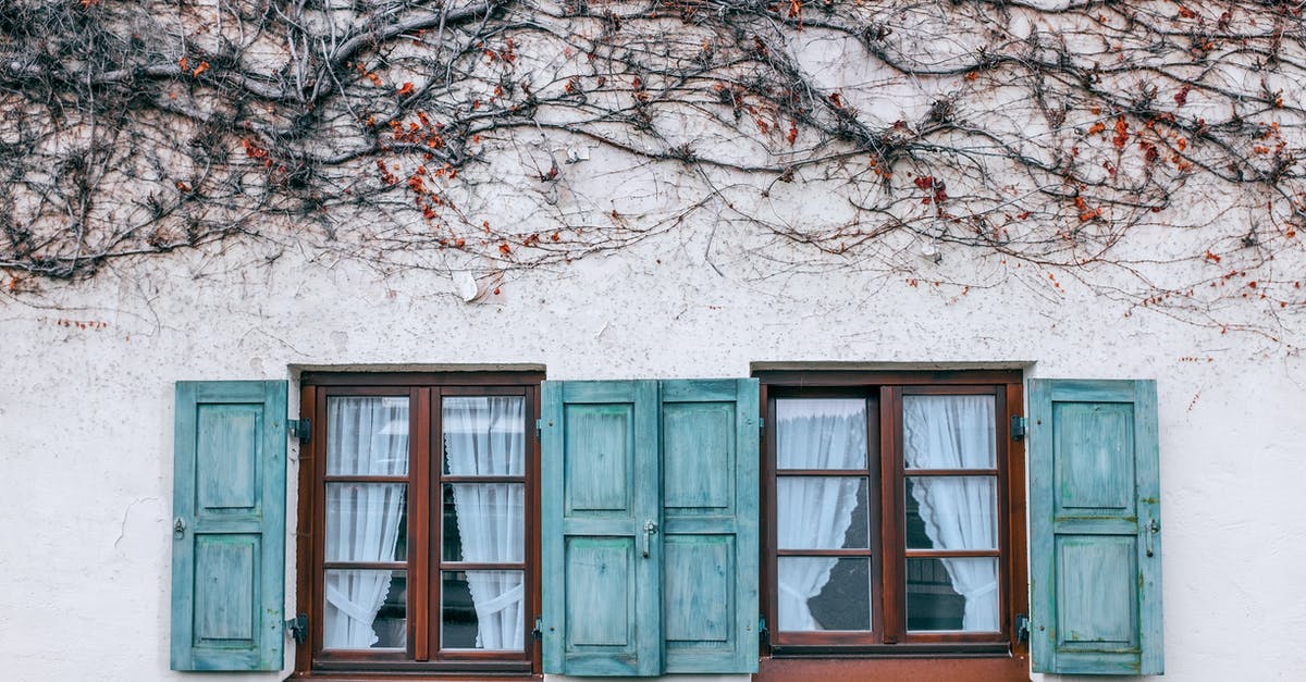 What is dry cottage cheese? - Facade of building with windows and plant