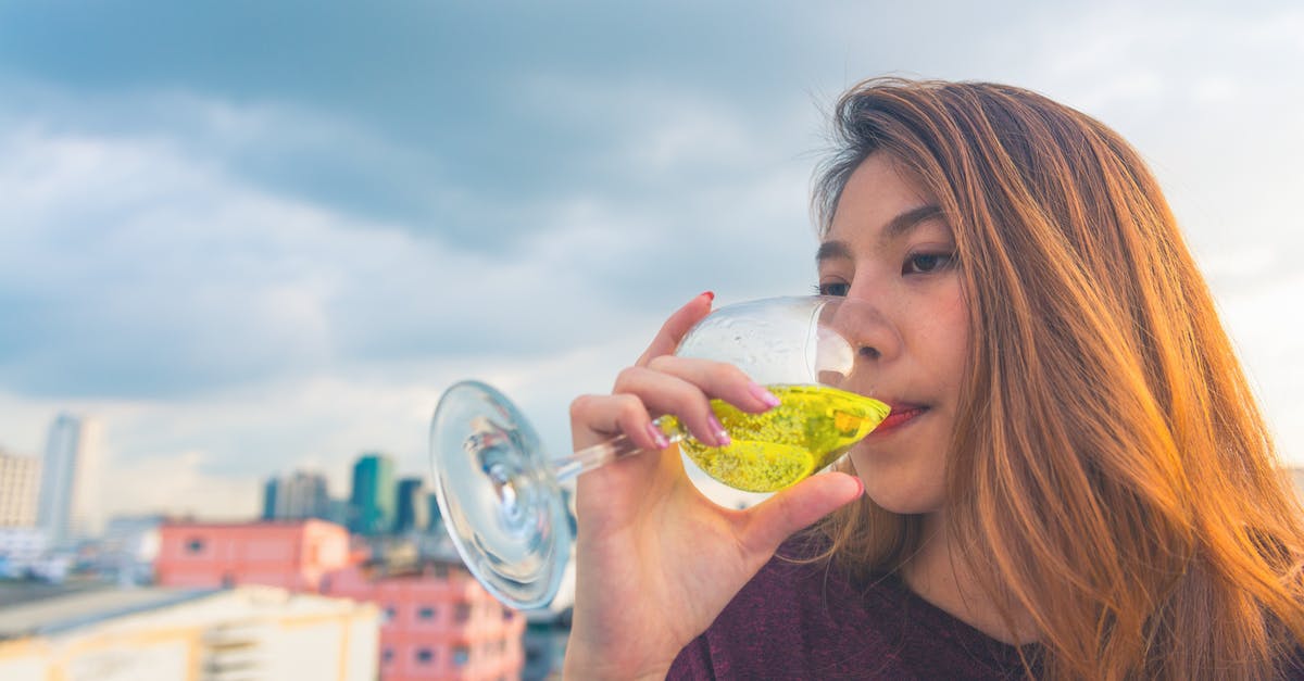 What is more difficult to make: beer or wine? [closed] - Woman in Purple Top Drinking on Clear Wine Glass