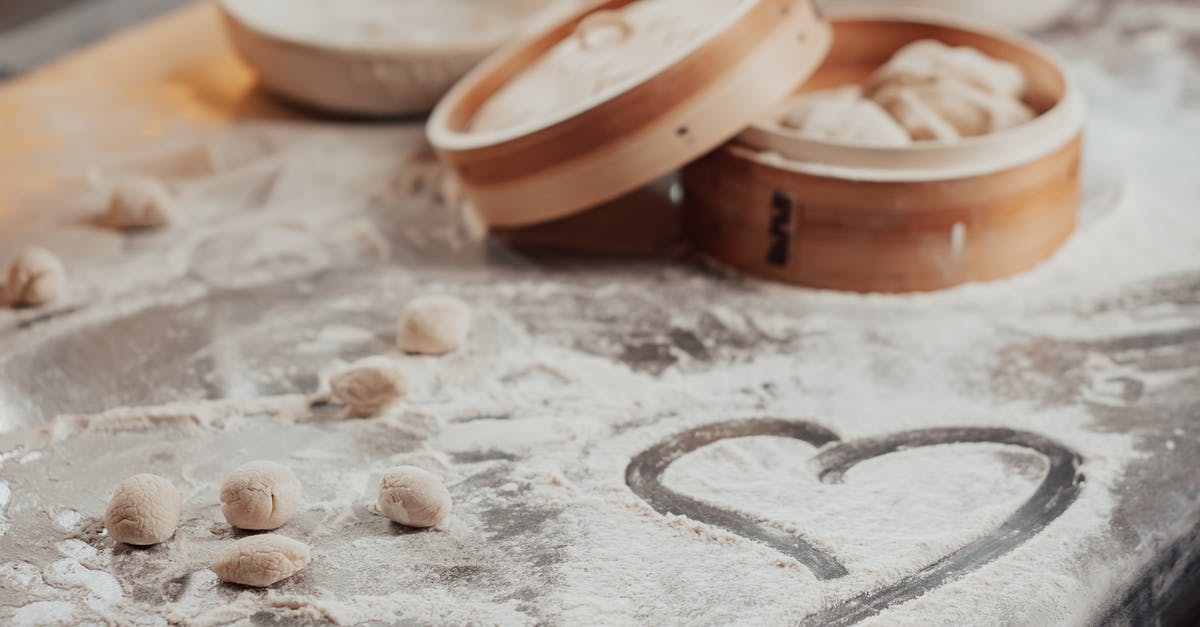 What is the 'Steam-Chill-Bake' method of making hot wings? - Brown and White Ceramic Bowls on White Textile