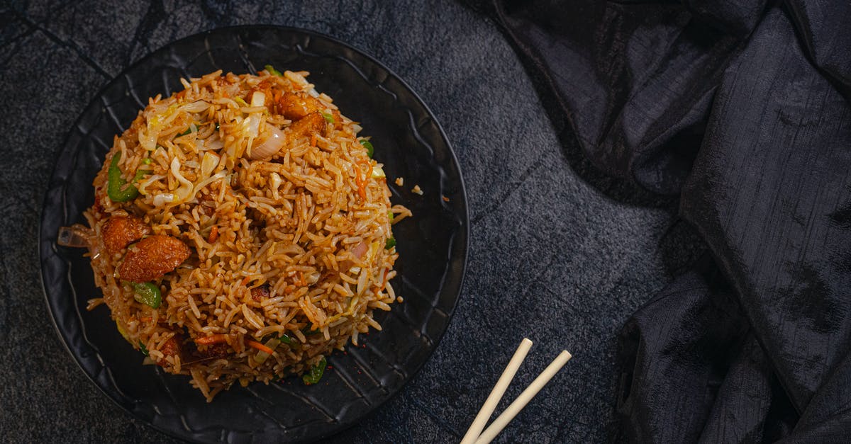 What is the best practice to making good fried rice without sticking to the pan? - Appetizing Asian dish with rice