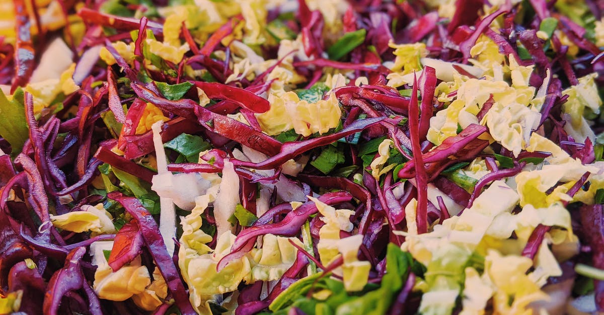 What is the Chinese celery and cabbage appetizer called and how is it made? - Salad with colorful cabbage and arugula