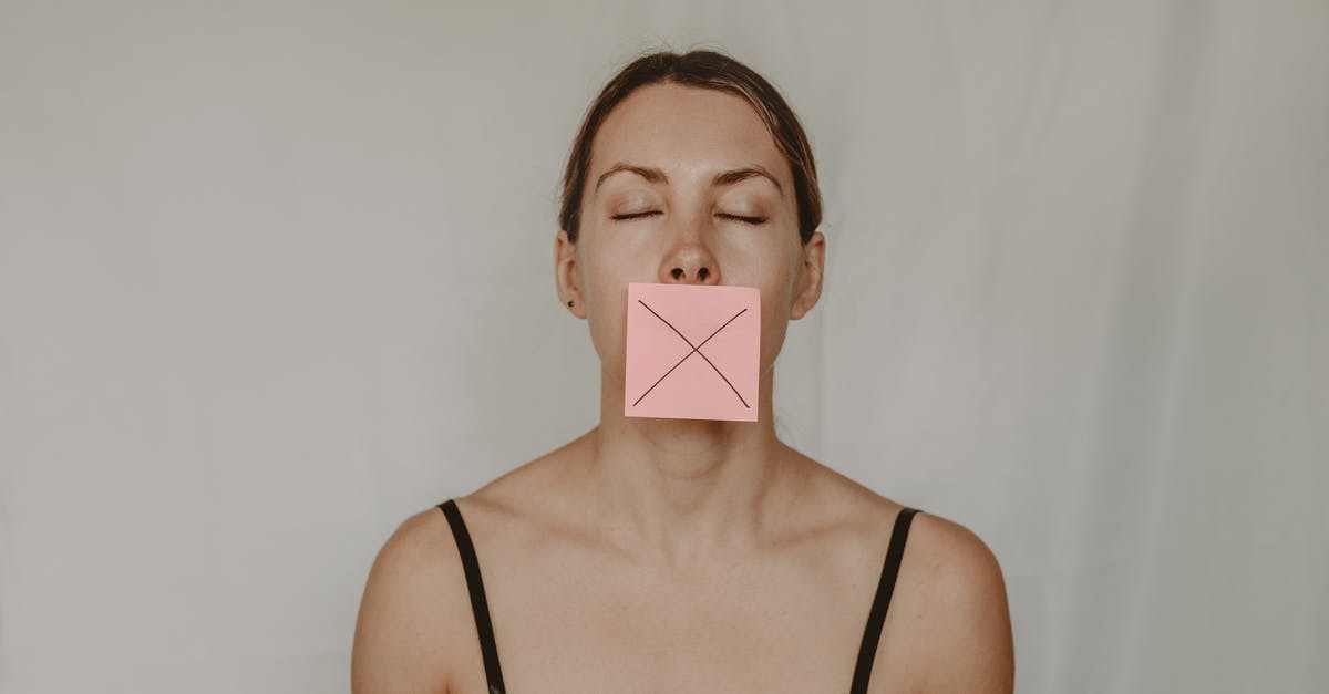 What is the danger in cross contamination? - Young slender woman with closed eyes and mouth covered with sticky note showing cross on white background