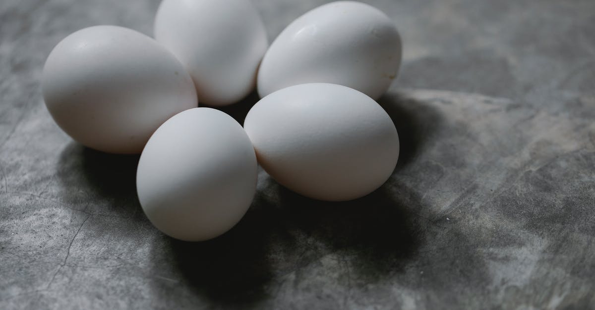 What is the difference between a hen and a chicken? In terms of cooking, flavor, price, and anything else culinary related. - Set of white uncooked eggs placed on marble surface