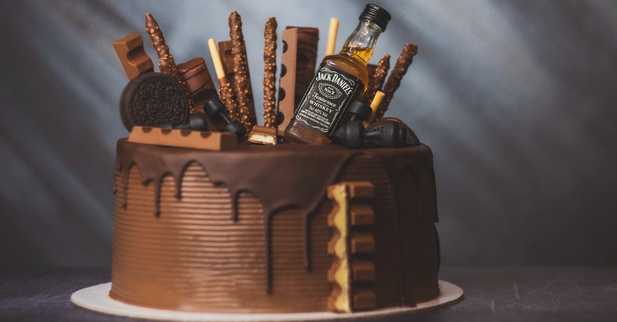 What is the difference between Devil's Food and Chocolate cake? - A Small Bottle of Jack Daniel's on a Chocolate Cake