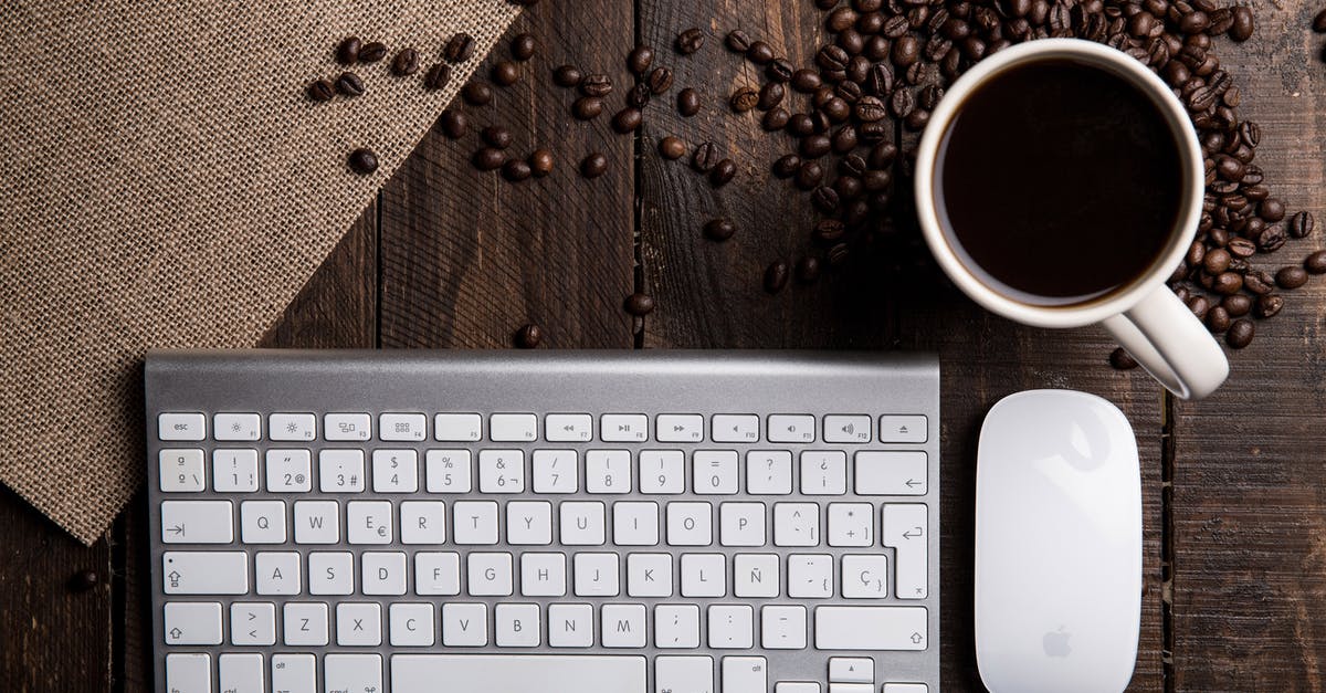 What is the difference between roasting and toasting? - Flat Lay Photography of Apple Magic Keyboard, Mouse, and Mug Filled With Coffee Beside Beans