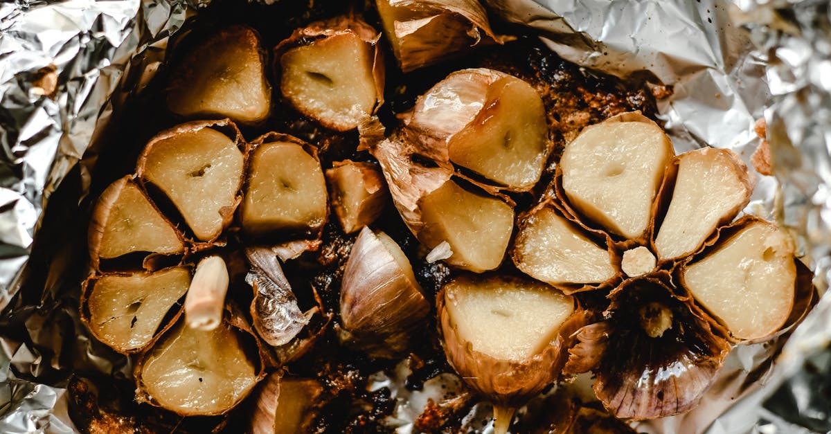 What is the difference between roasting, baking, and broasting? - Baked Garlic on Foil