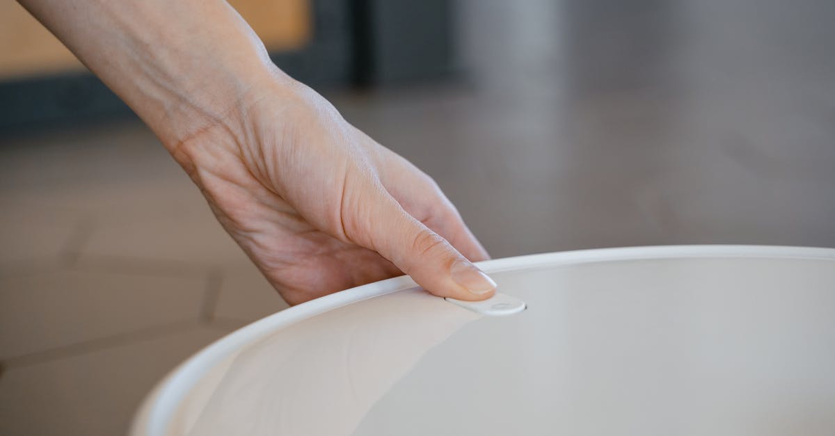 What is the following cooking utensil used for? - Person Holding White Ceramic Bowl