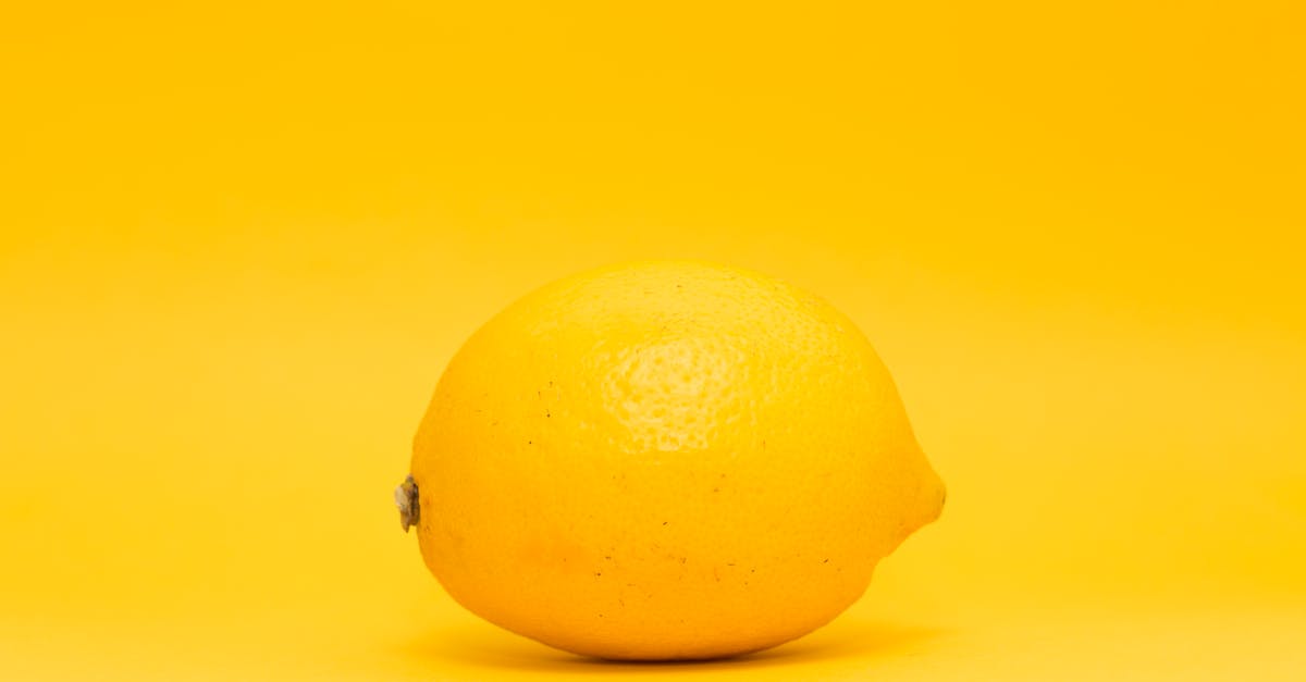 What is the main difference between lemon and lime? [closed] - Yellow Lemon Fruit on White Surface