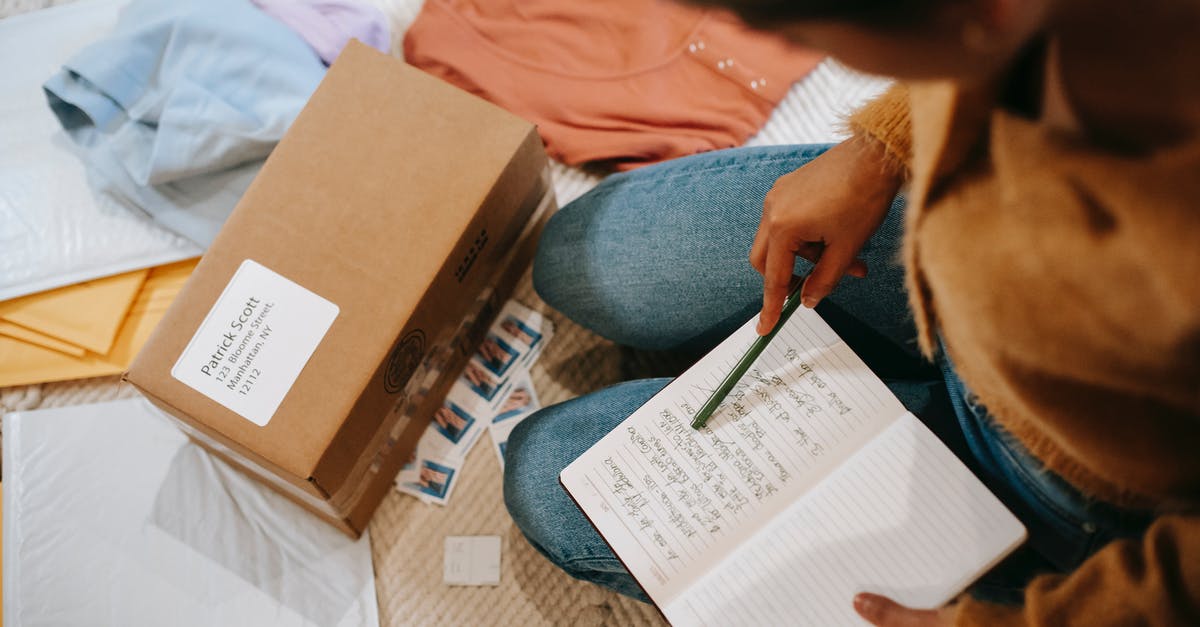 What is the name for this technique to prepare eggs? - Woman comparing information in notebook and carton box