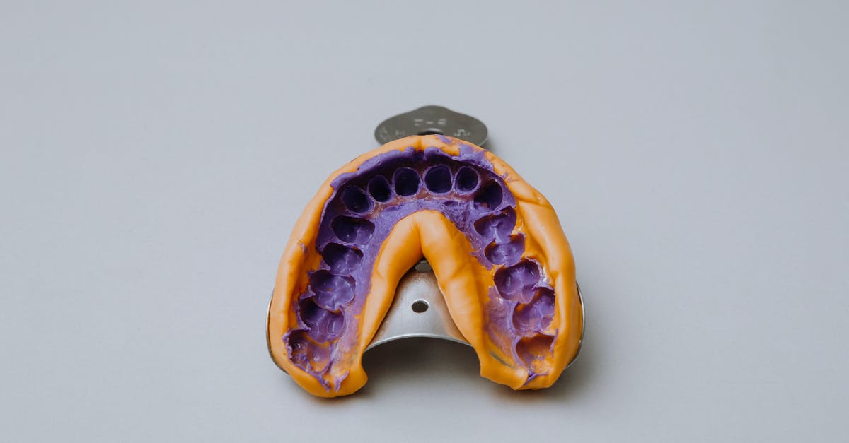 What is the name of the tool which involves a ball inside a sealed container that is shaken to grind up spices? - Alginate impression of teeth on impression tray