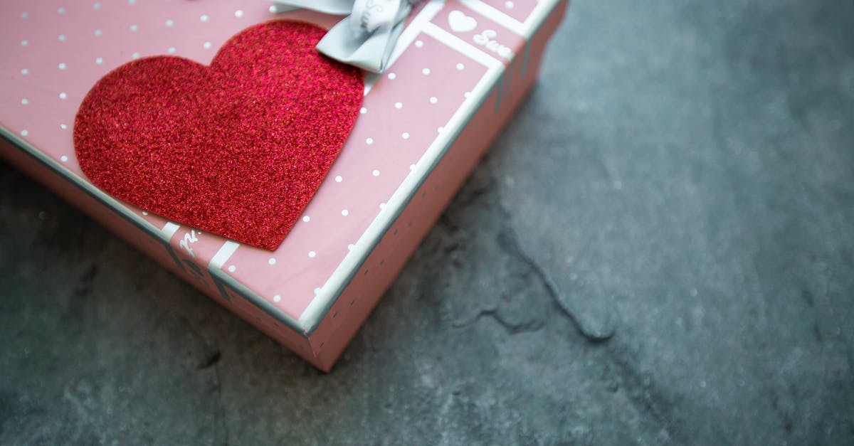 What is the padding with red substance inside of steak packaging? - Gift box with red heart