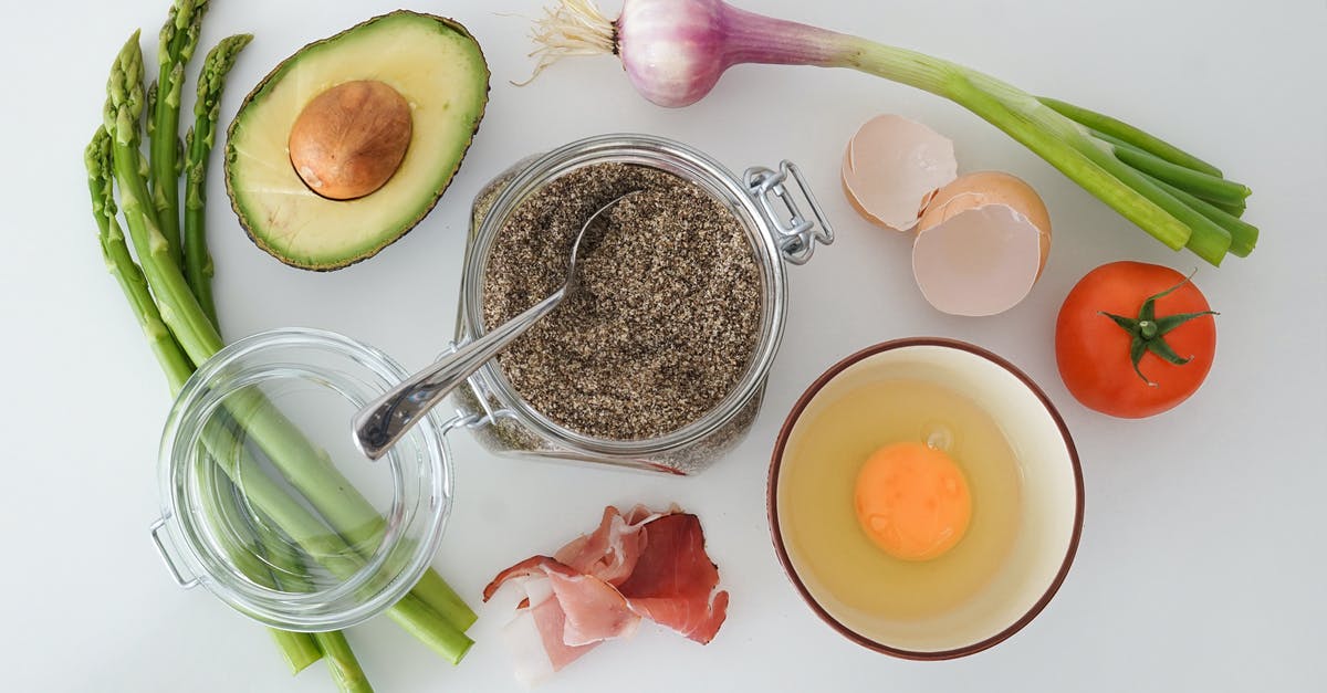 What is the recommended temperature for cooking eggs? - Spices Avocado and Ingredients on Table