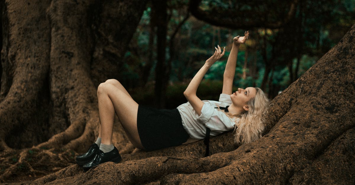 What is the role of butter in mash gravy? [closed] - Blonde Woman Lying on Massive Forest Tree Roots and Gesturing