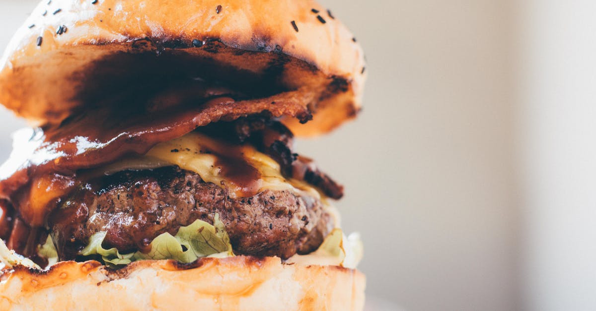What is the secret of making a really juicy burger? - Close-Up Photo Of Burger