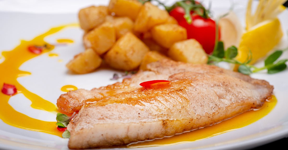 What is the smoking point of salmon fillet oil? - Close-up Shot of Fish Fillet in the Plate