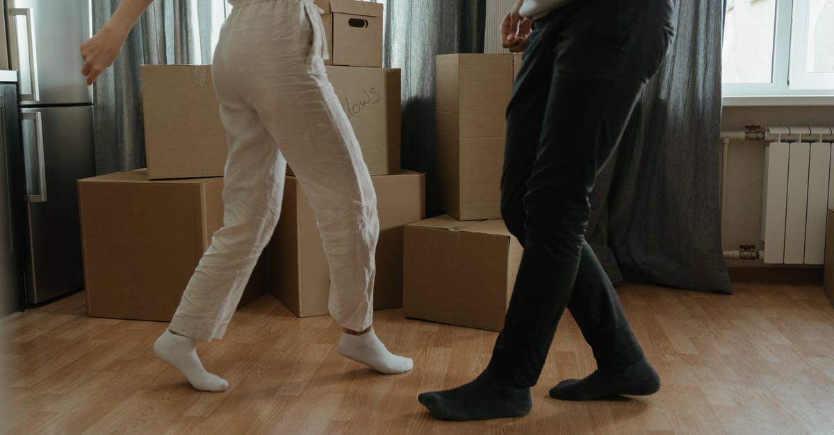 What is the storage life for whey? - Man in White T-shirt and Black Pants Holding Woman in White T-shirt