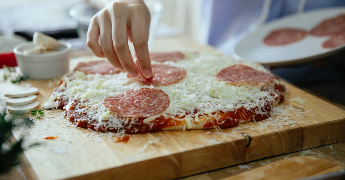 What is this French cuisine technique called, where "a piece of pheasant meat is cooked between two slices of veal, which are then discarded?" - Anonymous person cooking homemade pizza