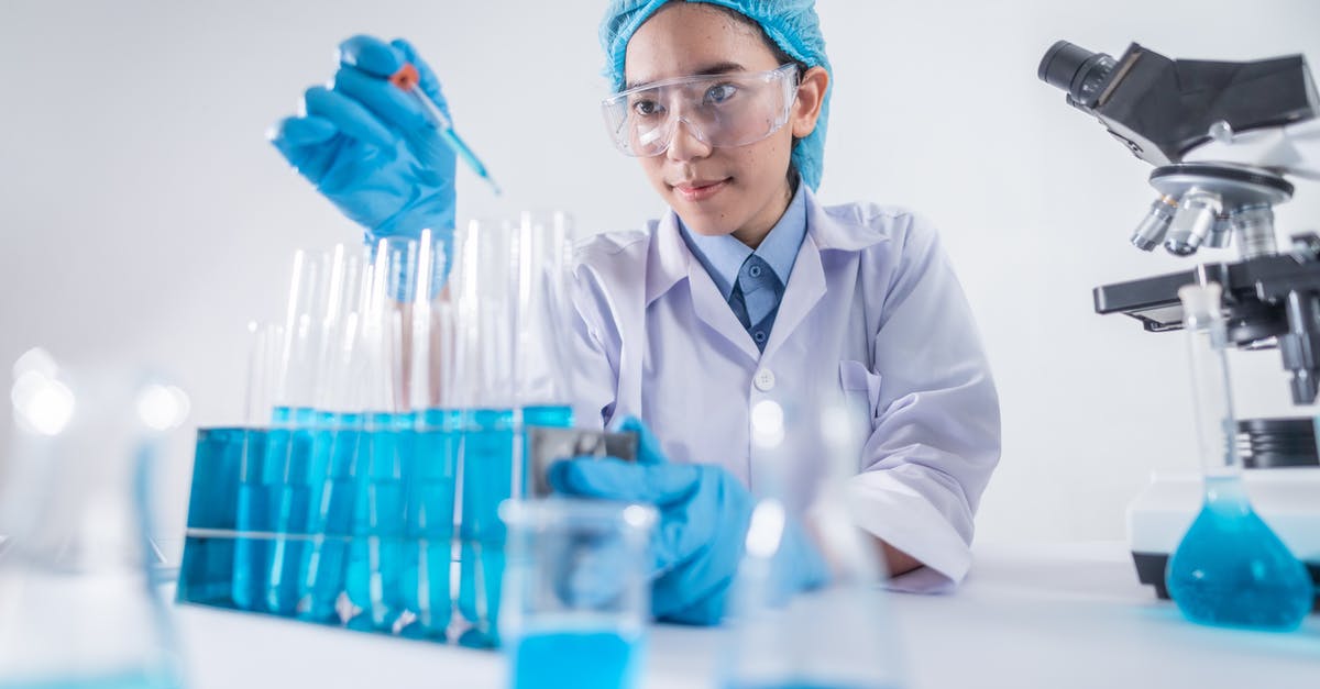 What is this glass object for? - Photo Of Female Scientist Working On Laboratory