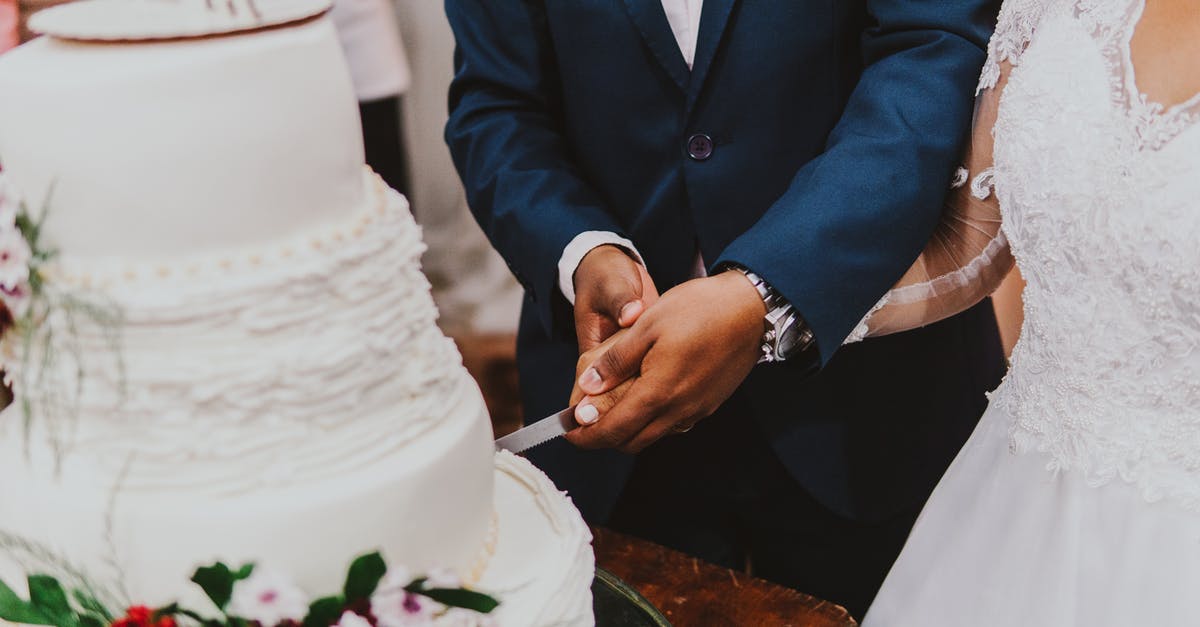 What is this slicing (?) tool? - Man in Blue Suit Holding White Plastic Spoon