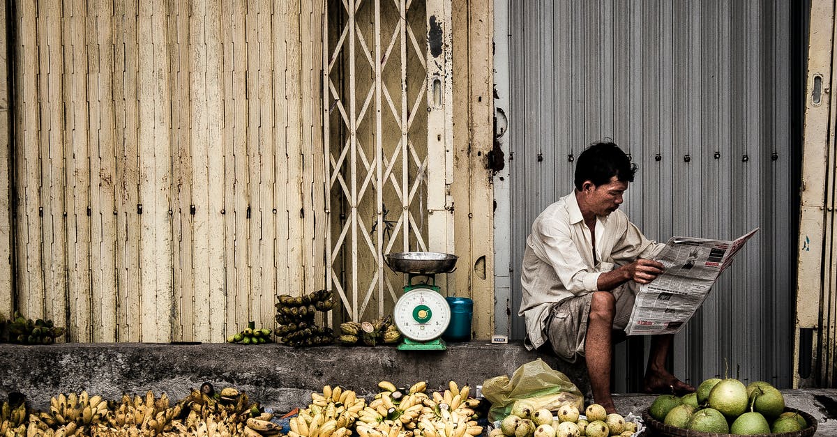 What is this Vietnamese Food? - Man Sitting Near Fruits