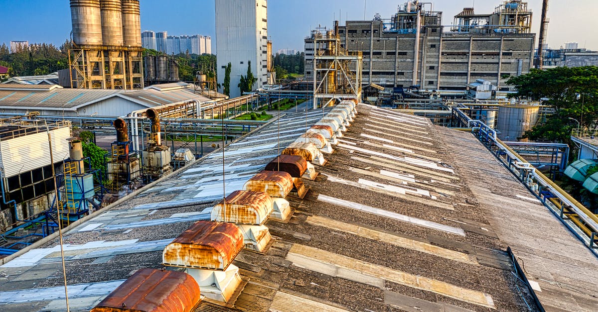 What is used in the production of dubu (Korean tofu)? - Industrial area with metal pipes and constructions