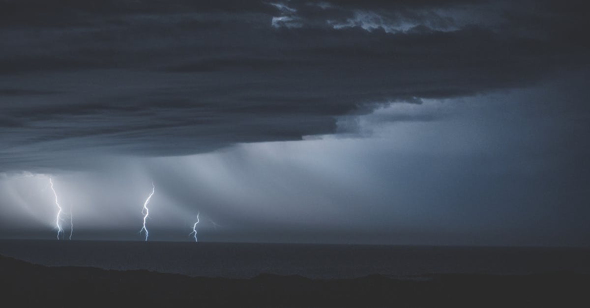 What is water temperature after electric kettle switches off? - Thunderstorm with glimmering lightnings over ocean