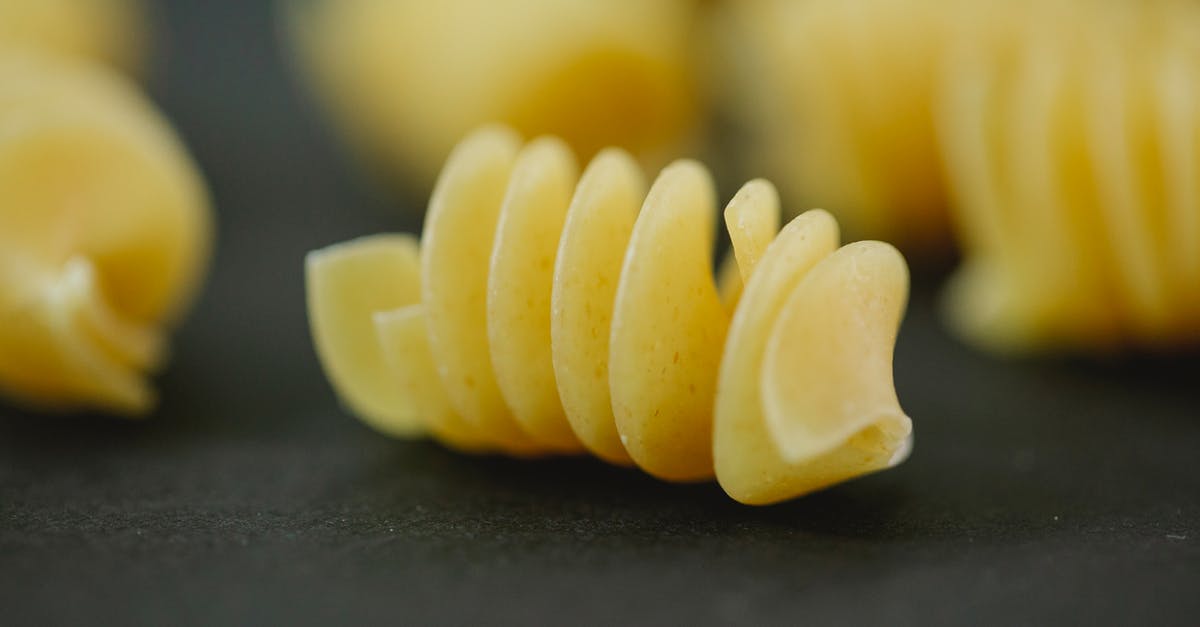 What is: Yellow Flour? - Closeup of fresh dried yellow fusilli pasta made with traditional Italian dough recipe