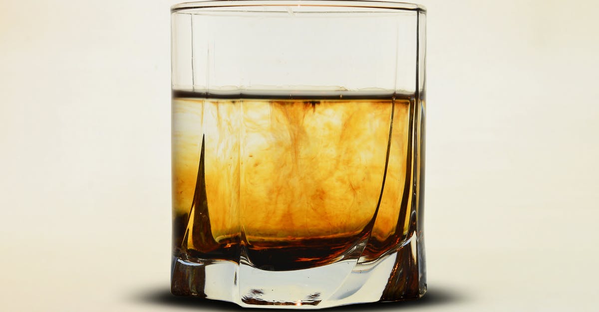 What kind of bourbon is best for making whiskey balls? - Clear Glass With Brown Liquid