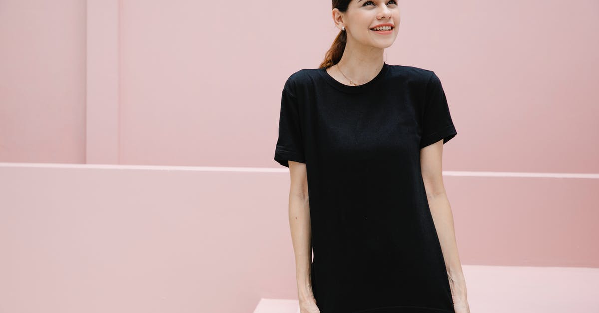 What kind of frosting doesn't need to be refrigerated? - Cheerful young female in casual apparel with brown hair looking up against stairs on pastel background