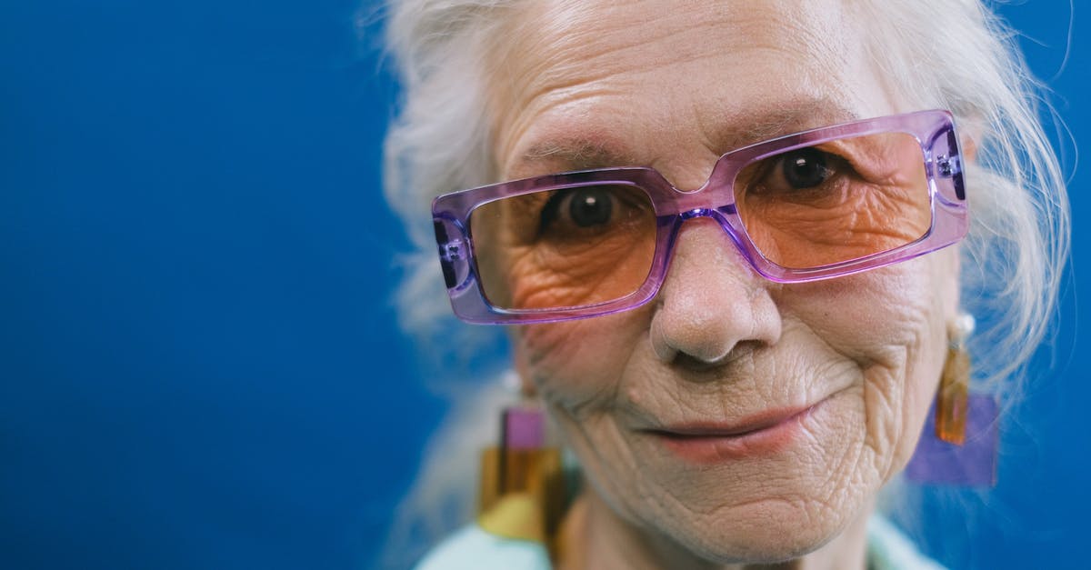 What kind of glass is this? - Smiling senior gray haired woman