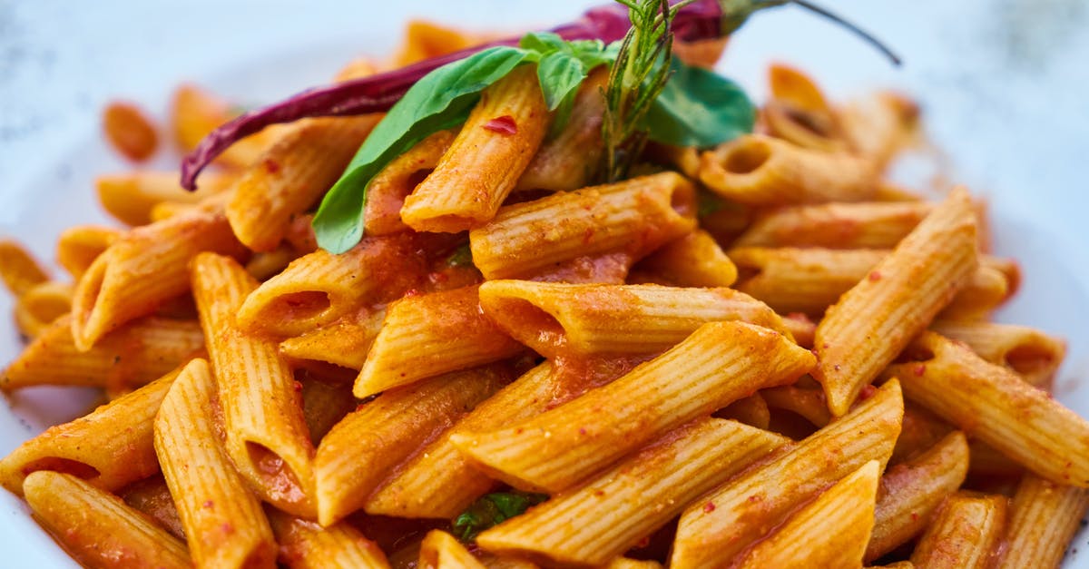 What kind of herbs are common in Italian dishes? - Closes-Up Photo of Macaroni