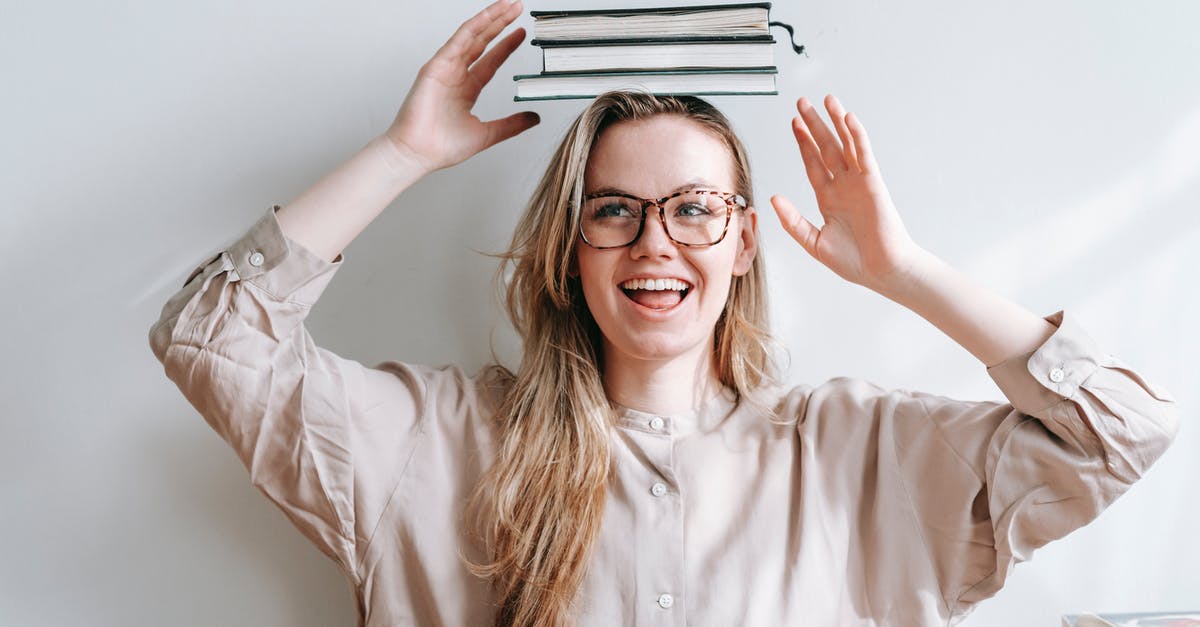 What kind of wok do I have? - Happy student with heap of books on head