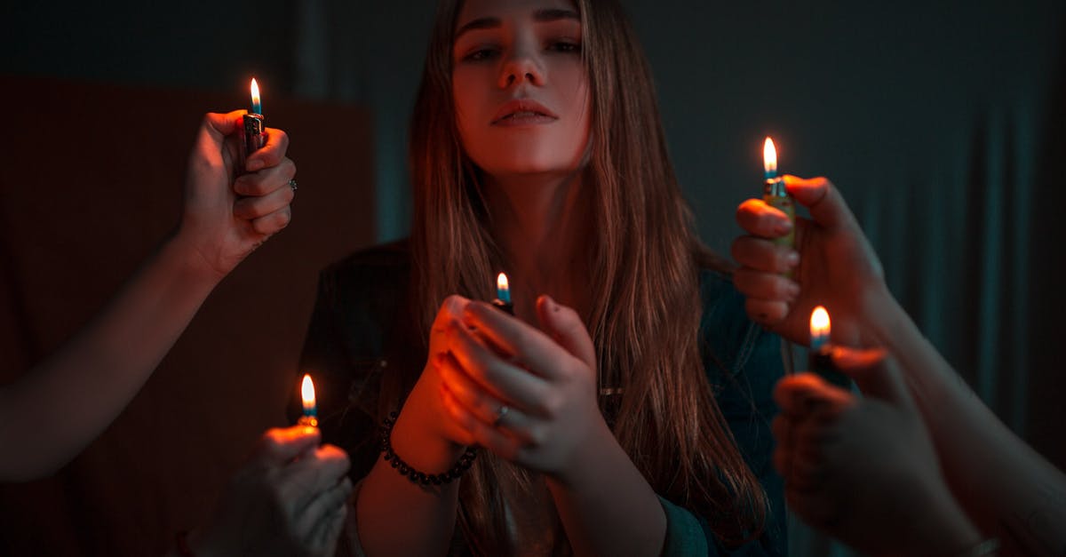 What kinds of frostings have a lighter texture? - Woman Holding Disposable Lighter