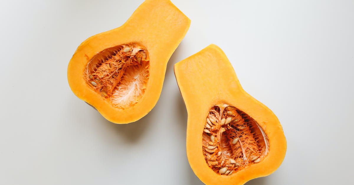 What method can I use to cook pumpkin seeds so that they turn out crunchy? - Close-Up Photo Of Sliced Squash 